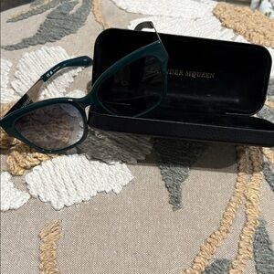 Alexander McQueen Teal Women's Glasses
Hard shell case included
Like new!!